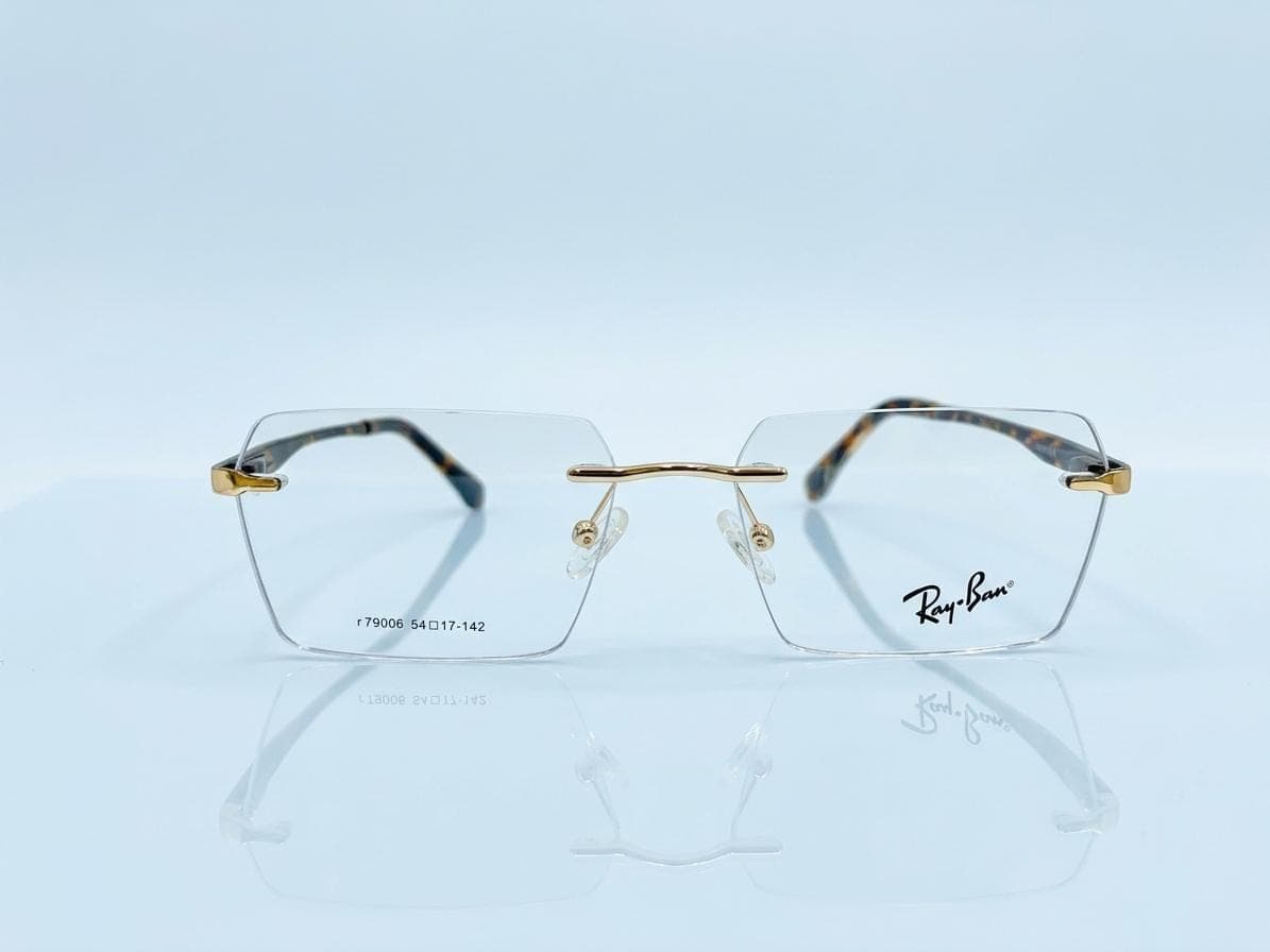 Ray-Ban Clear with Gold Bridge Rectangle Rimless Eyeglasses in Pakistan