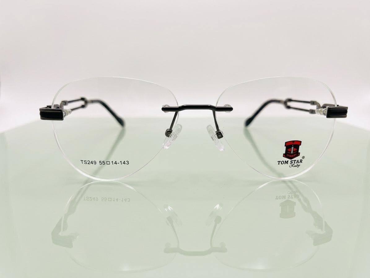 Tom Star Clear with Gunmetal Bridge Cat-eye Rimless Eyeglasses in Pakistan
