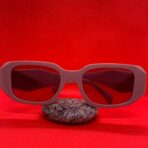 Prada Peach Sunglasses for Women – Luxury Eyewear with Broad Sticks